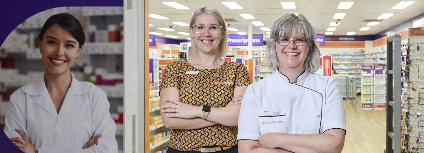 Pharmacists out the front of there store.